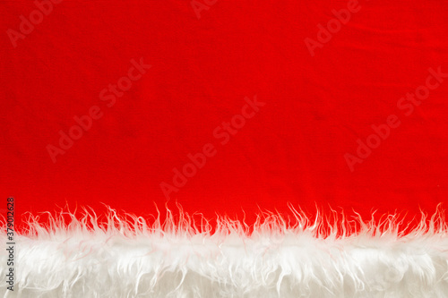 background artificial long white fur and red cloth christmas theme