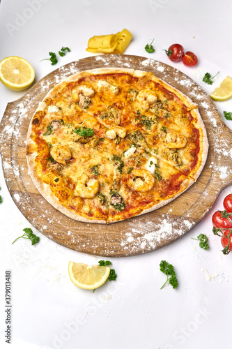 Seafood Italian pizza with mussels, prawn, mozzarella cheese and mushrooms
