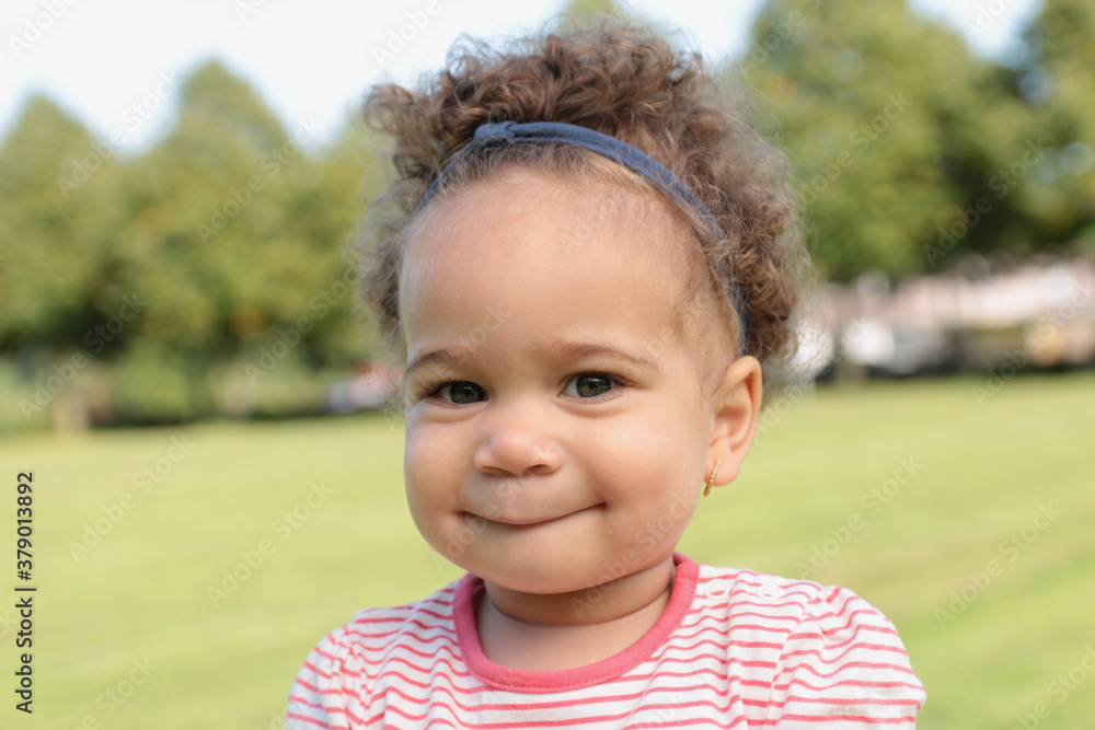 Portrait of a beautiful young afro girl outside Portrait of a beautiful young afro girl outside