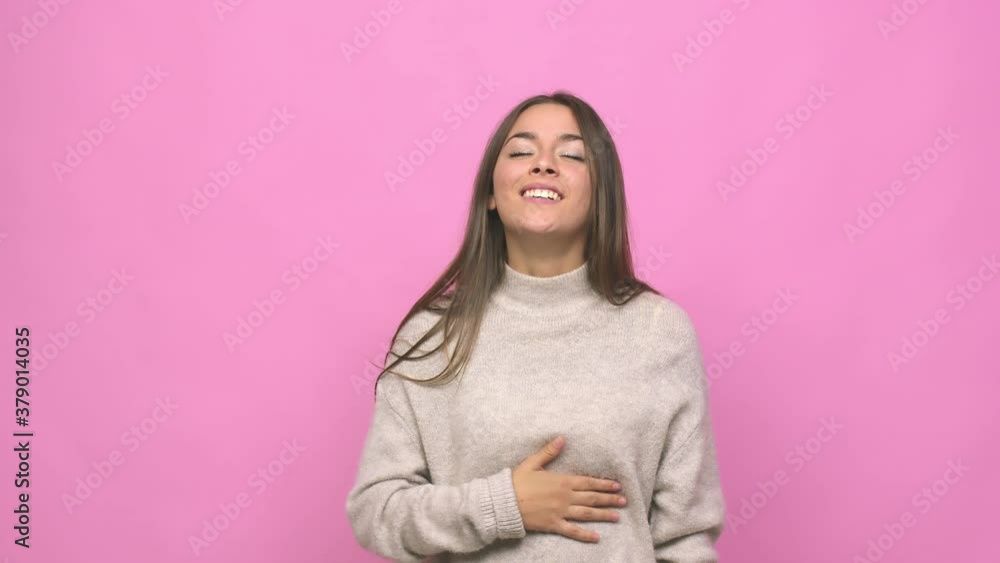Young cute woman touches tummy, smiles gently, eating and satisfaction concept Young cute woman touches tummy, smiles gently, eating and satisfaction concept