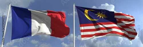 Flying flags of France and Malaysia on high flagpoles. 3d rendering