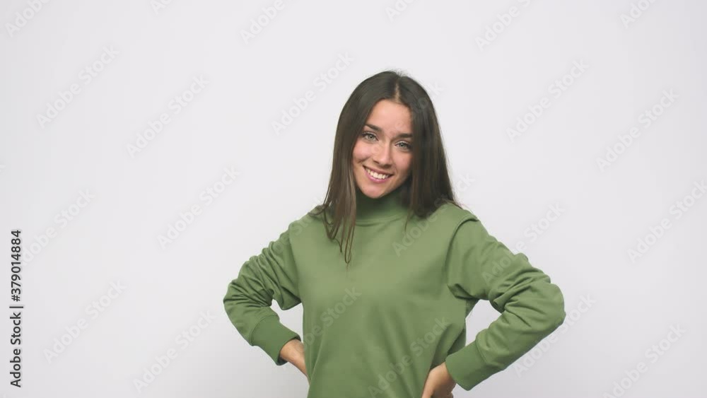 Young cute woman confident keeping hands on hips Young cute woman confident keeping hands on hips