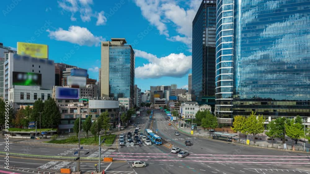 cloudy sky of seoul city south korea with traffic road in the financial district and best landmark in Seoul, South Korea.(time lapse 4k. zoom in)