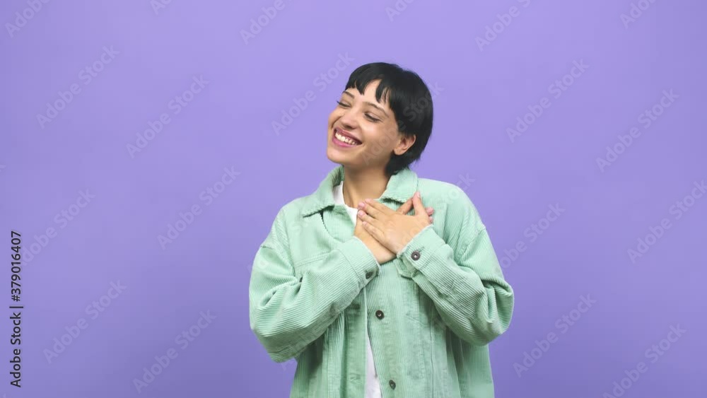 Young caucasian woman doing a romantic gesture, in love with someone or showing affection for some friend Young caucasian woman doing a romantic gesture, in love with someone or showing affection for some friend
