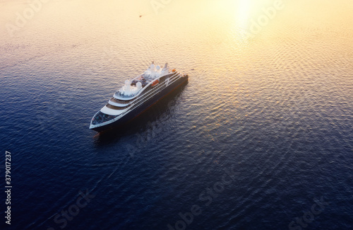 Aerial view on cruise ship during sunset. Adventure and travel. Landscape with cruise liner on Mediterranean sea. Luxury cruise. Travel - image