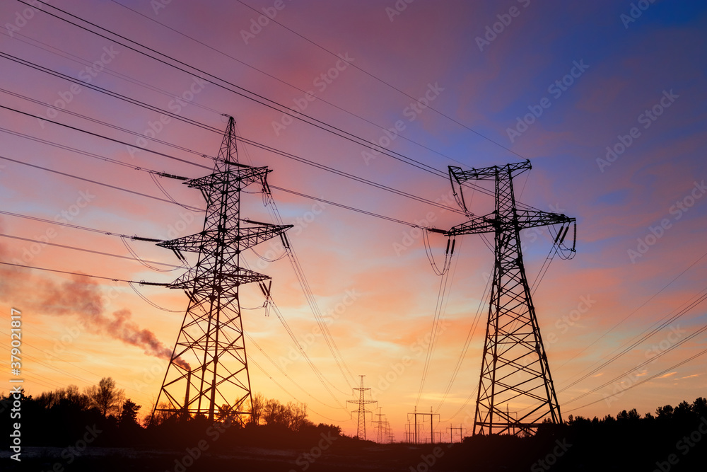 industrial power line / bright photo against the backdrop of a sunset ned