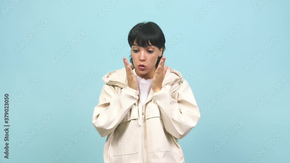 Young caucasian woman surprised and shocked, looking with wide eyes, excited by an offer or by a new job Young caucasian woman surprised and shocked, looking with wide eyes, excited by an offer or by a new job