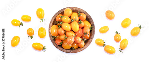 yellow cherry tomatoes isolated on white background. Top view food background. Place for text