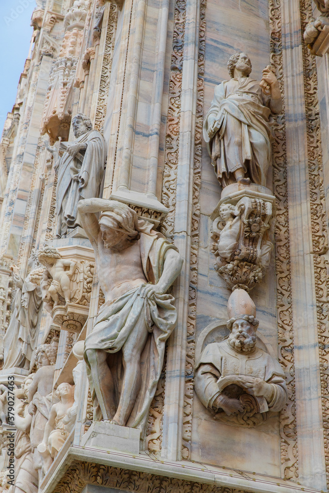 Milan, Italy September 19, 2019. Details of the facade Milan Cathedral Duomo di Milano (Cattedrale di Santa Maria Nascente) on Square Piazza Duomo.