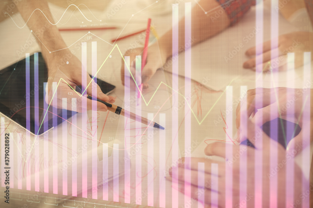 Double exposure of forex graph drawing and man and woman working together holding and using a mobile device. Trade concept. Double exposure of forex graph drawing and man and woman working together holding and using a mobile device. Trade concept.