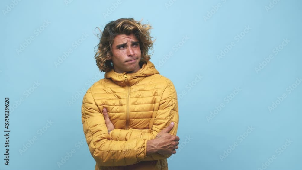 Young cool australian man unhappy looking in camera with sarcastic expression Young cool australian man unhappy looking in camera with sarcastic expression
