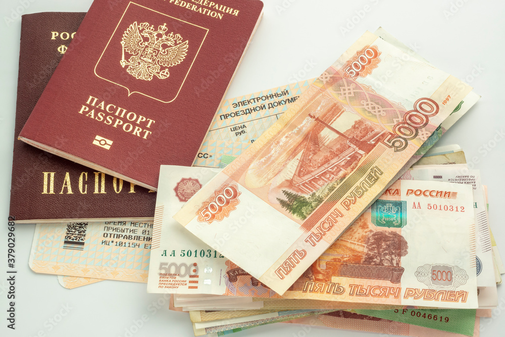 Passports of Russian citizen and ruble banknotes in cash are on train tickets Passports of Russian citizen and ruble banknotes in cash are on train tickets