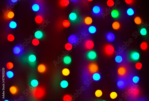 Defocused colorful abstract lights, christmas bokeh background.