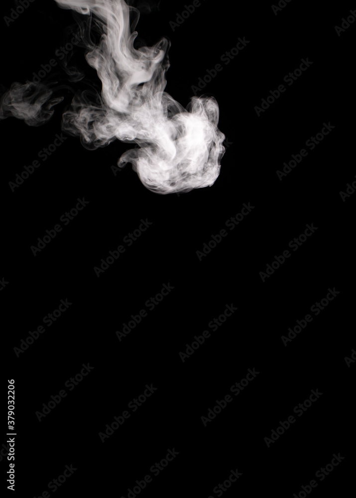 Fototapeta premium Descending stream of white smoke swirls chaotically in whimsical patterns on a black background