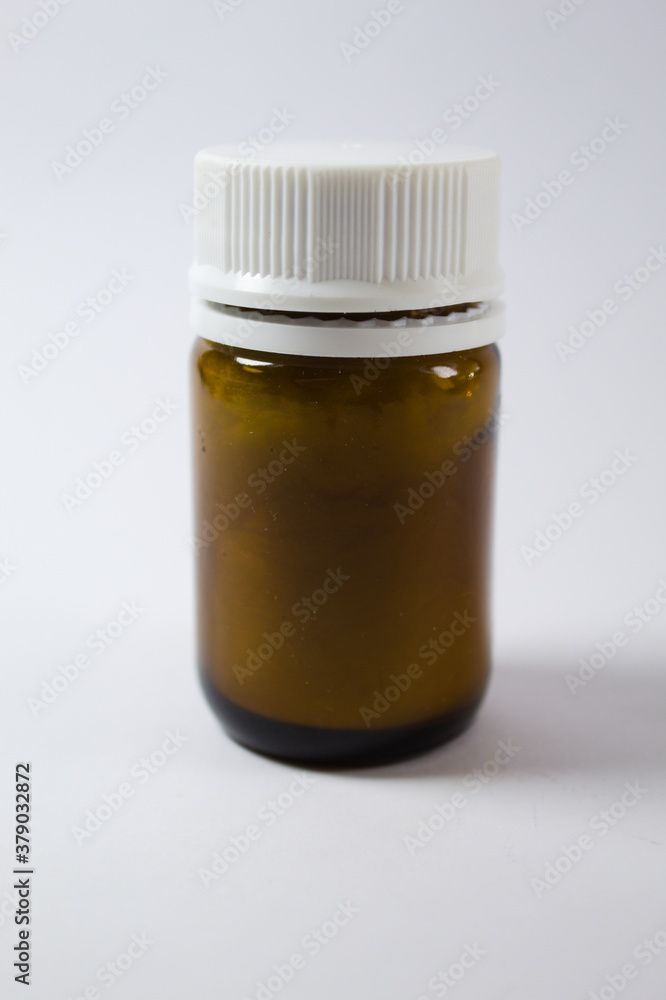 Medicine bottle with white cap Medicine bottle with white cap