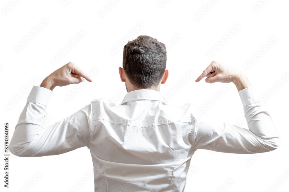 a man in a white shirt stands with his back to the camera and points to his back a man in a white shirt stands with his back to the camera and points to his back