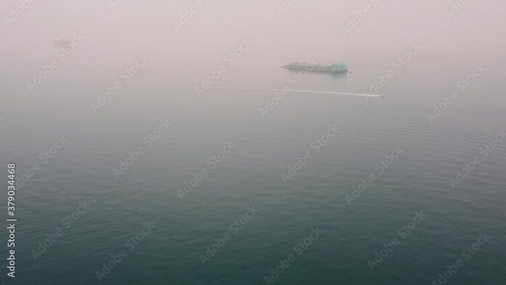 Aerial view of cargo ship waiting in the waters near Vancouver Aerial view of cargo ship waiting in the waters near Vancouver