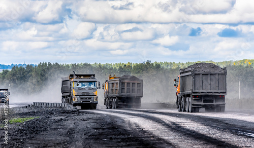 The road on which heavy trucks carry coal from the quarry for many years