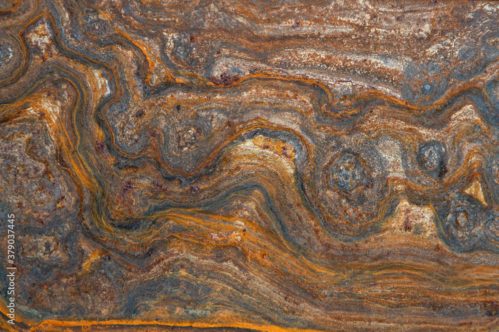 metal surface with curly rust, stains of different degrees of oxidation