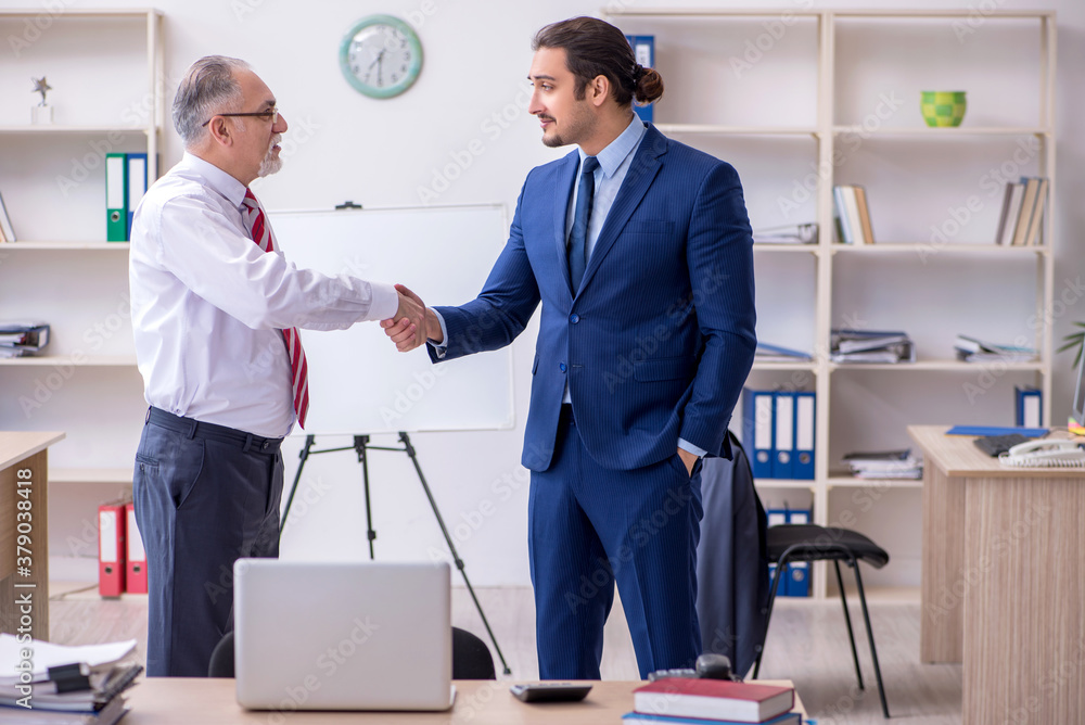 Two employees in the office