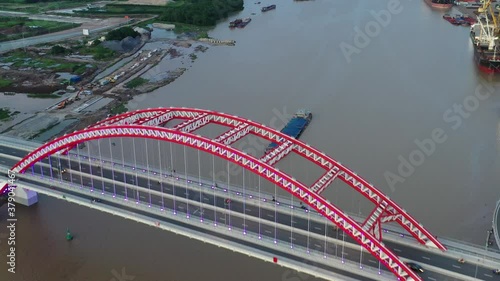 Hai phong, Vietnam Aug 2020 4k aerial video of Hoang Van Thu Bridge during late afternoon