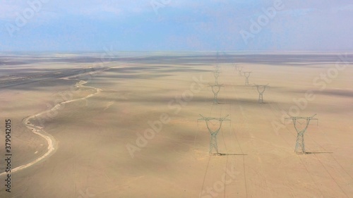 aerial view of telegraph pole in desert