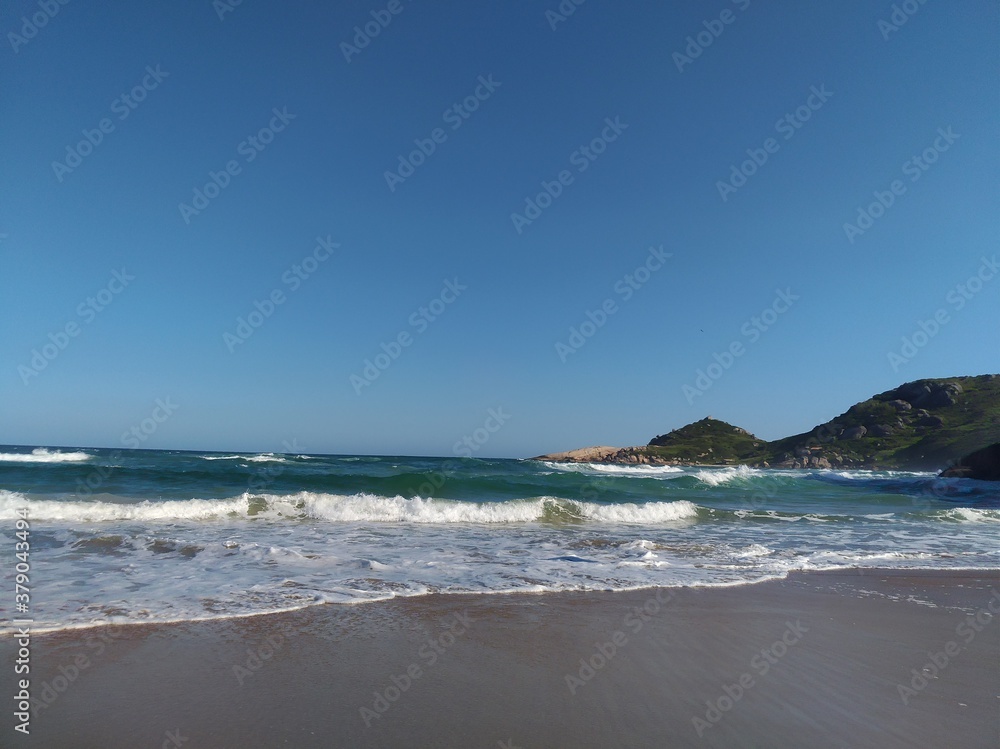 beach and sea. Praia Mole, Florianópolis - Brasil.