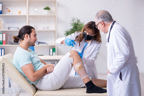 Young leg injured man in the hospital