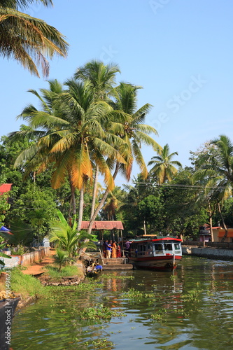 Local People waiting and Boarding the ferryboat on Kerala Backwaters in Alleppey, Kerala, India