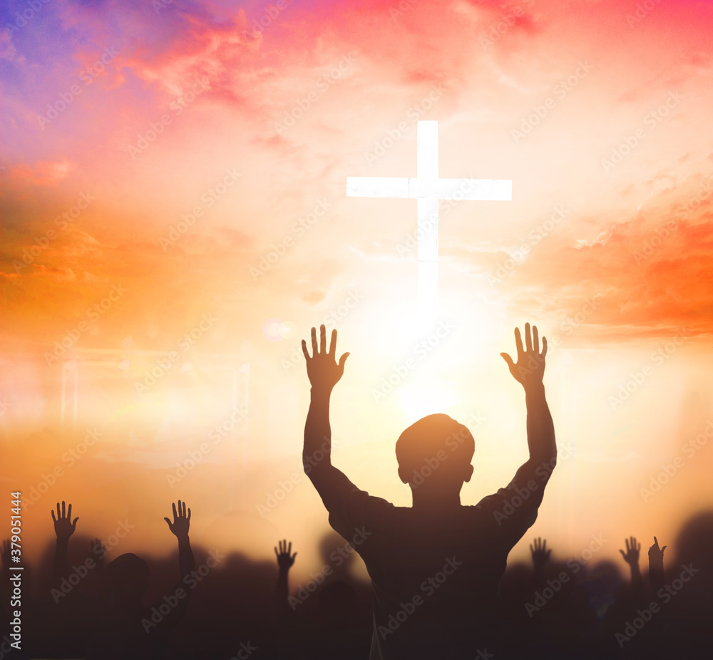 Worship concept christian people Raise hand over cross on spiritual