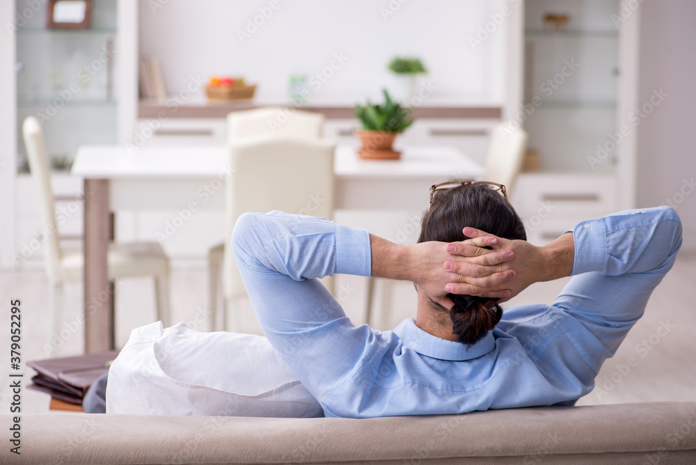 Tired businessman employee working from home Tired businessman employee working from home