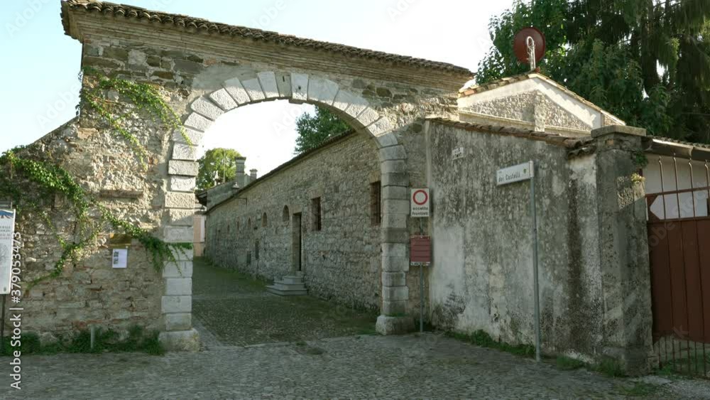 ancient entrance gate to the medieval rural village of Strassoldo, Italy ancient entrance gate to the medieval rural village of Strassoldo, Italy