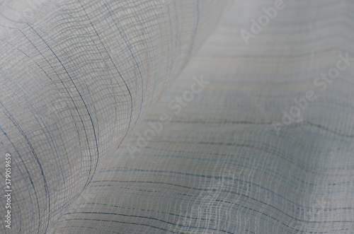 Texture of Mesh Fabric for Abstract Background.