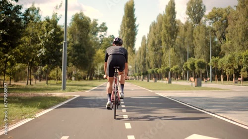Wallpaper Mural Triathlete Cyclist Training On Bicycle.Fit Athlete Workout Training Cycling For Triathlon Competition.Cyclist Fitness Riding On Road Bike And Getting Ready For Triathlon.Hard Workout.Sport Concept. Torontodigital.ca