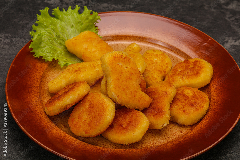Fried chicken nuggets served salad leaves Fried chicken nuggets served salad leaves