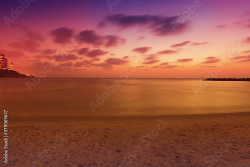 Seascape. Beach in the evening. Netanya city during sunset, Israel