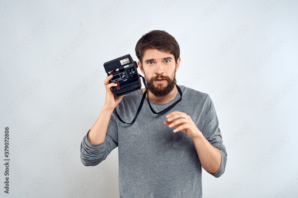 Male photographer professional camera work Studio Technology modern art light background