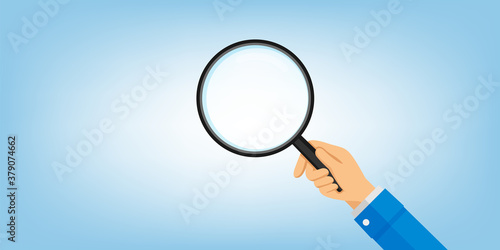 magnifying glass in hand isolated on light blue, copy space, (search, spy, detective, inspection, finding and exploration concept)