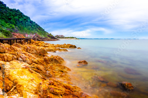 The sea spray hitting the rocks in the afternoon at Khao Laemya National Park Thailand.