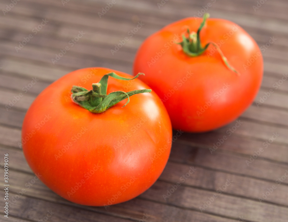 ripe appetizing rispentomatoes tomatoes on wooden table ripe appetizing rispentomatoes tomatoes on wooden table