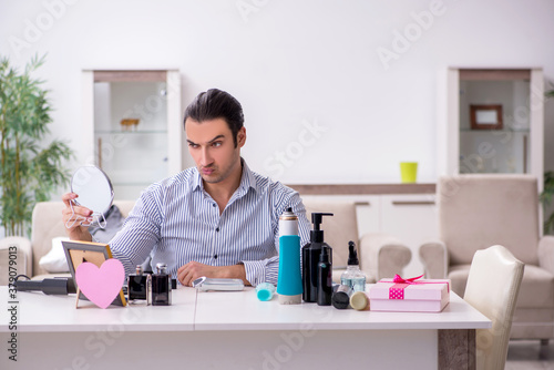 Young handsome man preparing for date