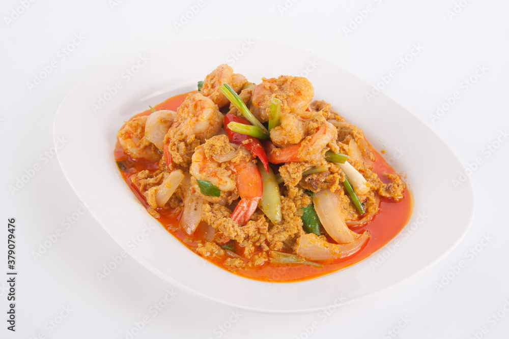 Stir Fried Shrimp with Curry Powder in white dish on table Stir Fried Shrimp with Curry Powder in white dish on table