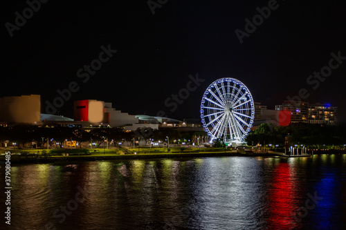 Nightscape view of Brisbane city with famous ferris wheel