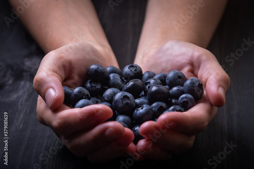 Handful of blueberries © Anton_Shvets