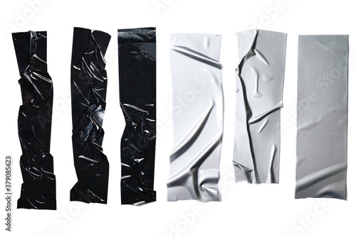 Set of various pieces of black and grey reinforced duct tape photo