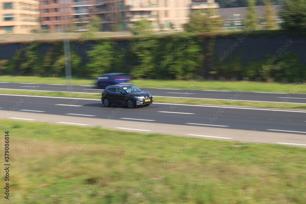 Fototapeta premium car panning on highway.