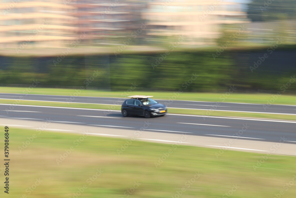 Fototapeta premium car panning on highway.