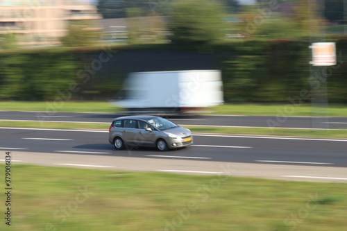 car panning on highway. © Weekly