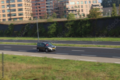 car panning on highway.