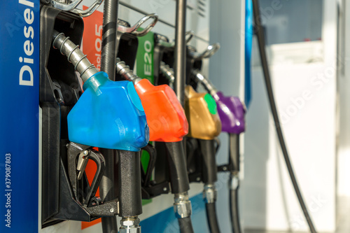 Wallpaper Mural Fuel Pump, Gas Station, Gasoline.Colorful Petrol pump filling nozzles isolated on white background , Gas station in a service in warm sunset.Head fuel vehicle refueling facility in Asia Torontodigital.ca